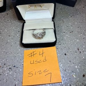 Used beautiful 925sterling silver/white Saphire stone size 7. This is ring #4